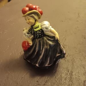 Vintage Hummel musical Bavarian girl.